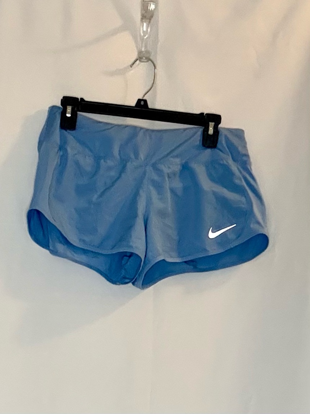 Nike Women's Sky Blue Athletic Shorts with White Swoosh